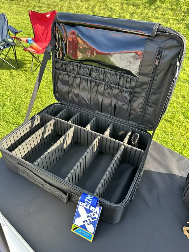Current MYVICI organiser empty, showing the adjustable dividers, mesh pockets and zipped lid storage at Scurry Events