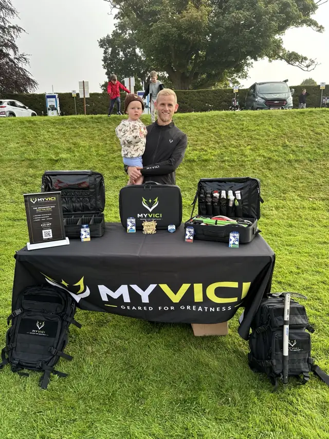 Lewis, MYVICI founder, behind the branded organiser display at Scurry Events